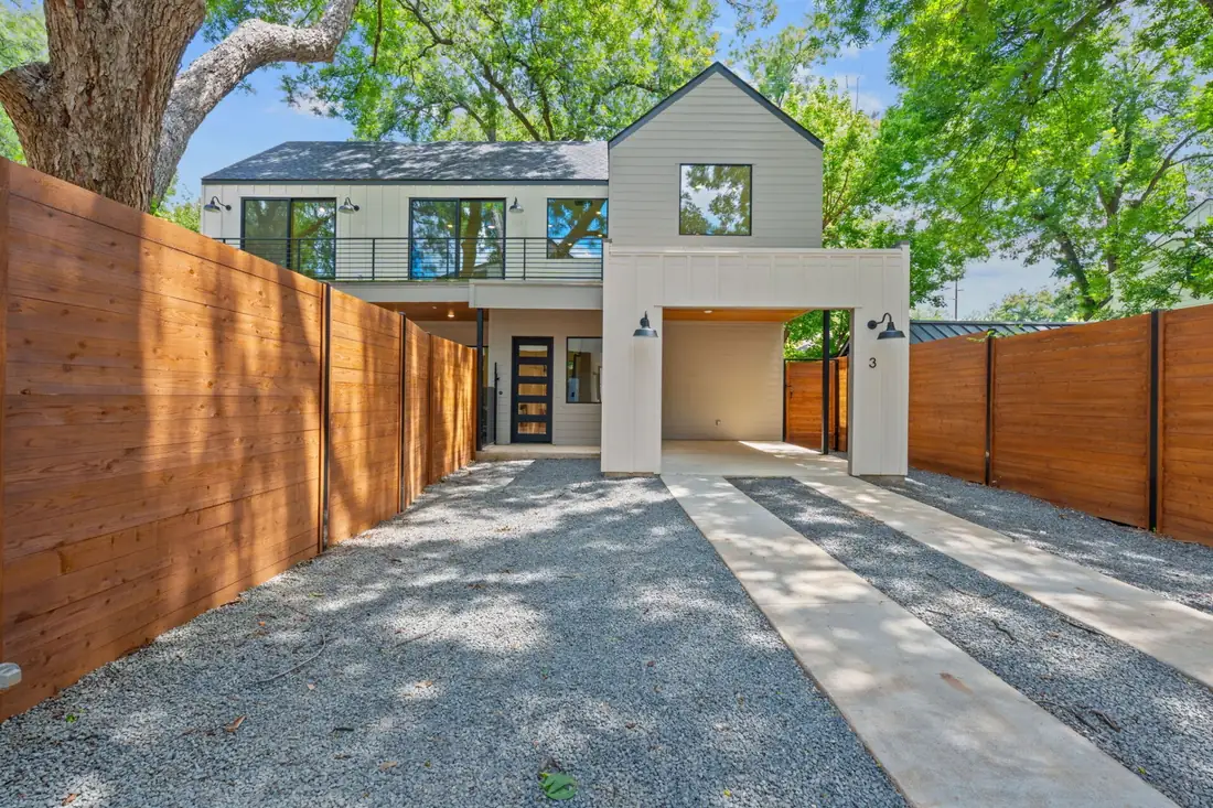 A Precise custom home on Holly St in East Austin, seen from the drive