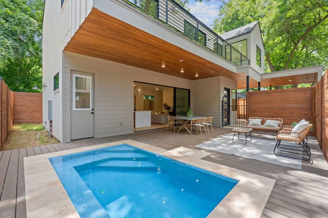 Plunge pool and patio at a three-home Precise project on Holly St
